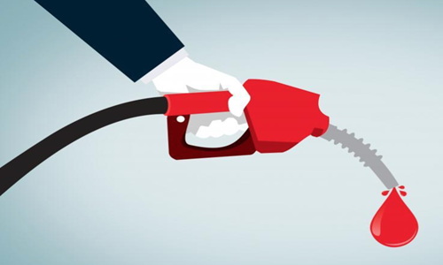 Hand-Holding-Red-Nozzle-Pumping-Gas-Fossil-Fuel-Oil-and-Petrol-from-Freerange.png